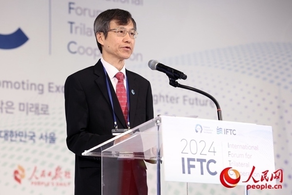 中日韓合作秘書處秘書長李熙燮致開幕辭。主辦方供圖